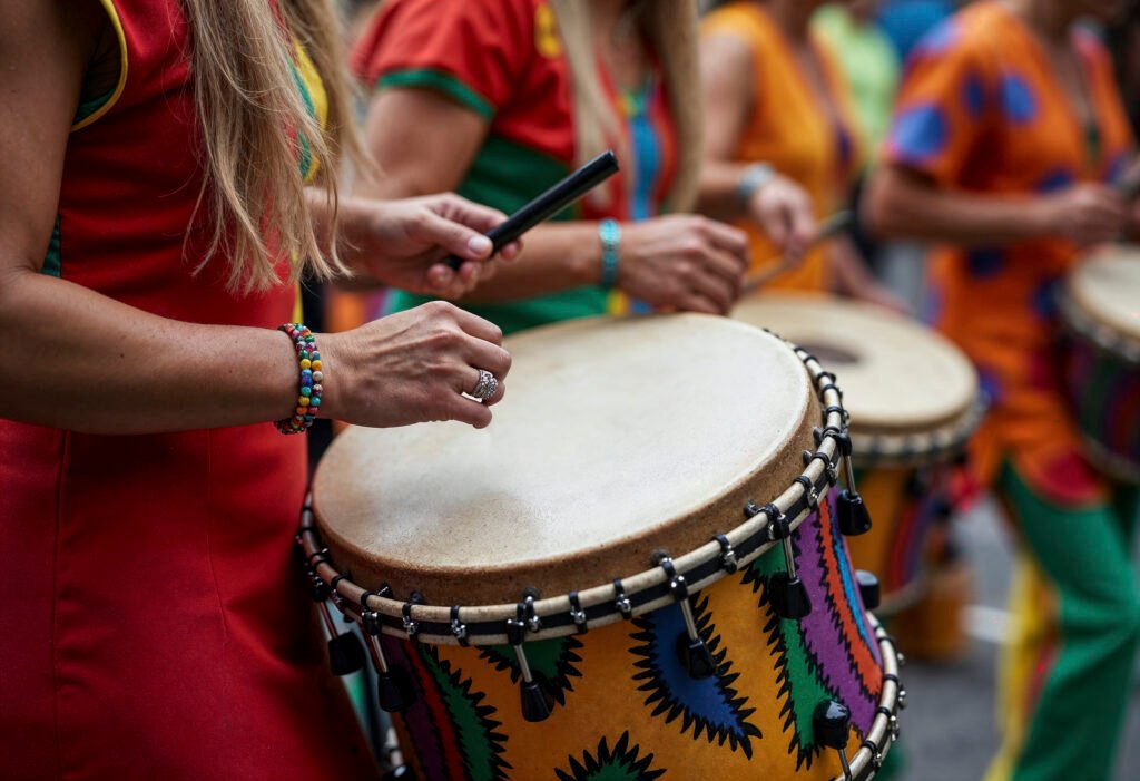 close up people playing drums carnival