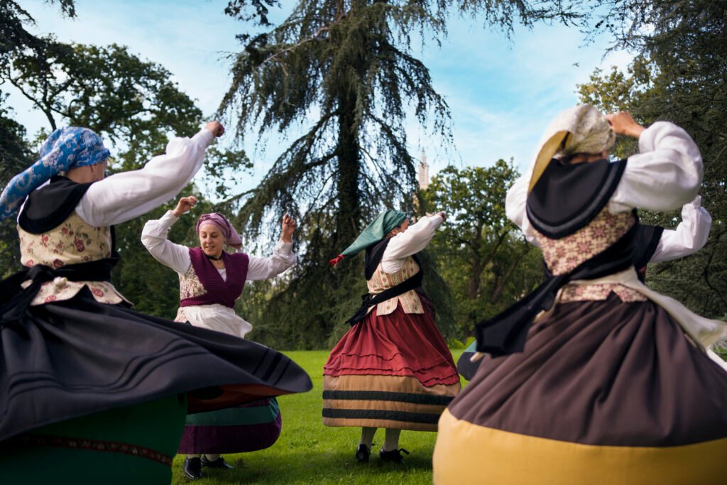 full shot women dancing folk (1)